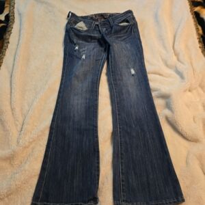 062725 knockout skinnyboot refuge. Distressed  size 10 R blue jeans.box 22d#